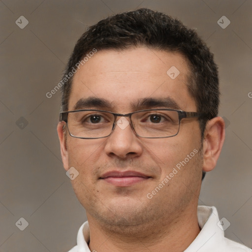 Joyful white adult male with short  brown hair and brown eyes