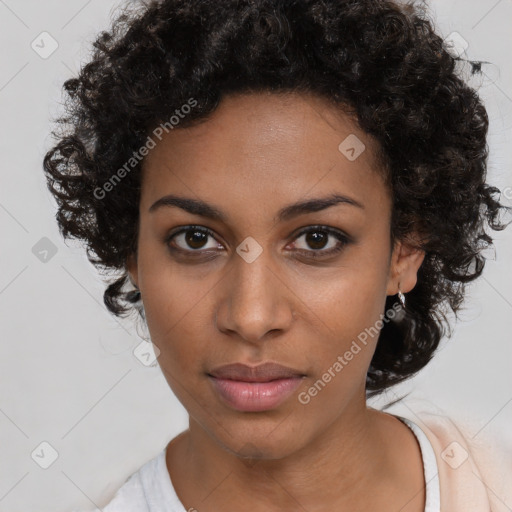 Neutral black young-adult female with medium  brown hair and brown eyes