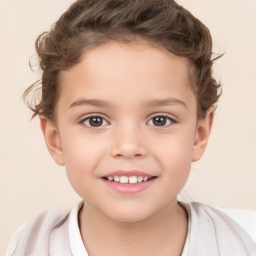 Joyful white child male with short  brown hair and brown eyes