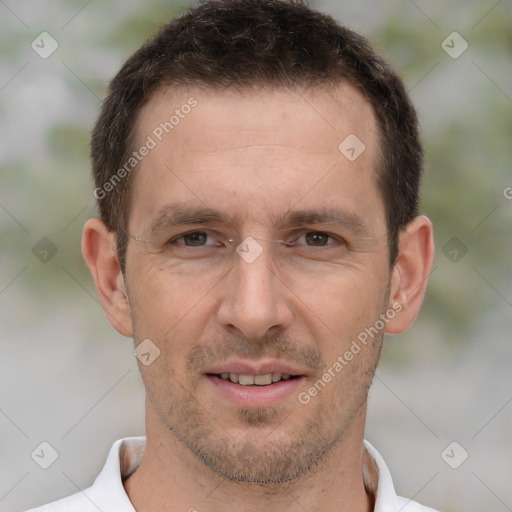 Joyful white adult male with short  brown hair and brown eyes