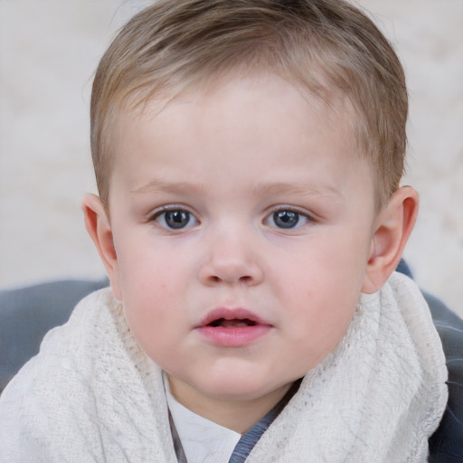 Neutral white child male with short  brown hair and blue eyes