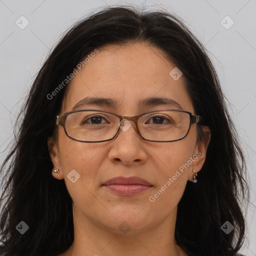 Joyful white adult female with long  brown hair and brown eyes