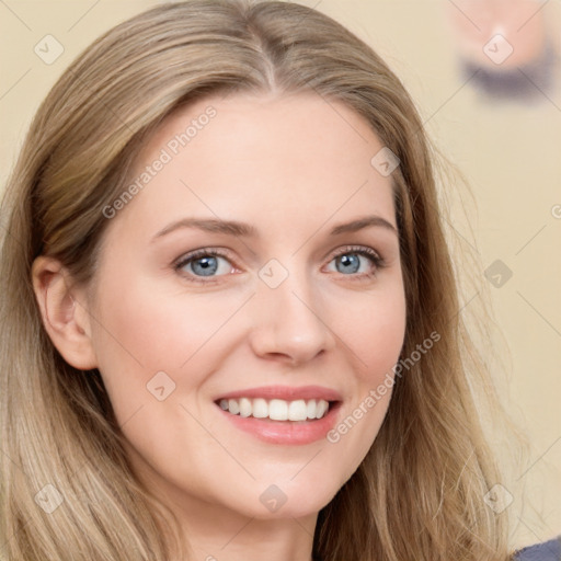 Joyful white young-adult female with long  brown hair and blue eyes