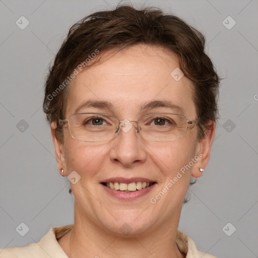 Joyful white adult female with short  brown hair and brown eyes