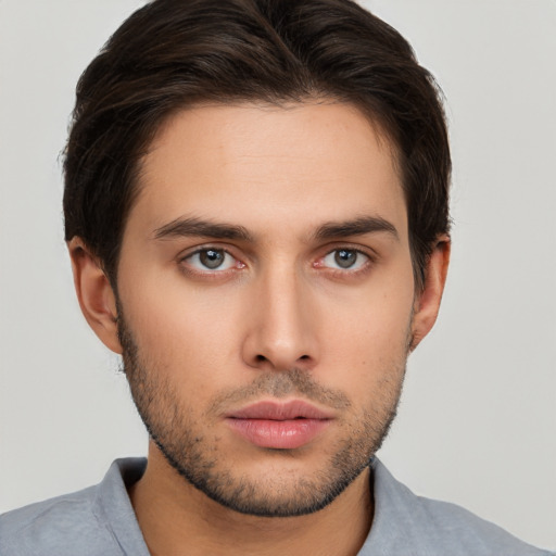 Neutral white young-adult male with short  brown hair and brown eyes