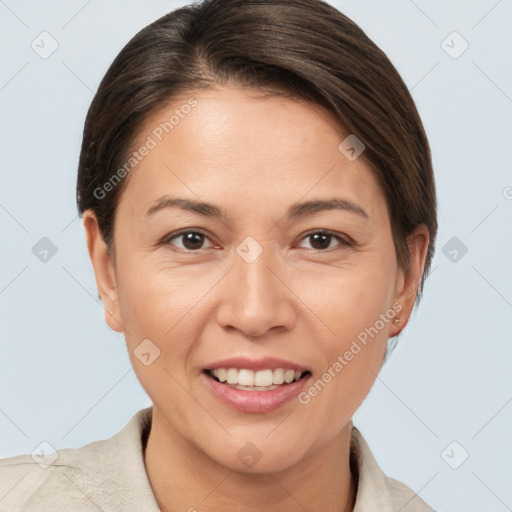 Joyful white adult female with short  brown hair and brown eyes