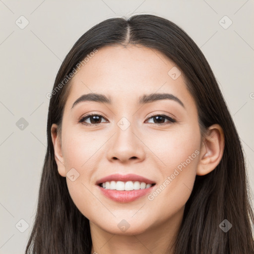 Joyful white young-adult female with long  black hair and brown eyes