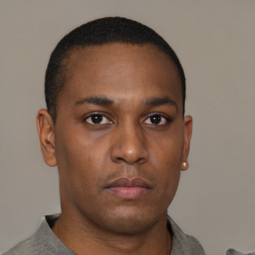 Neutral black young-adult male with short  brown hair and brown eyes