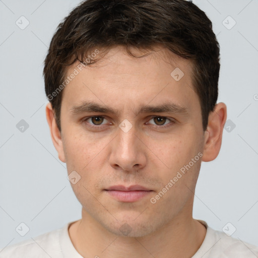 Neutral white young-adult male with short  brown hair and brown eyes