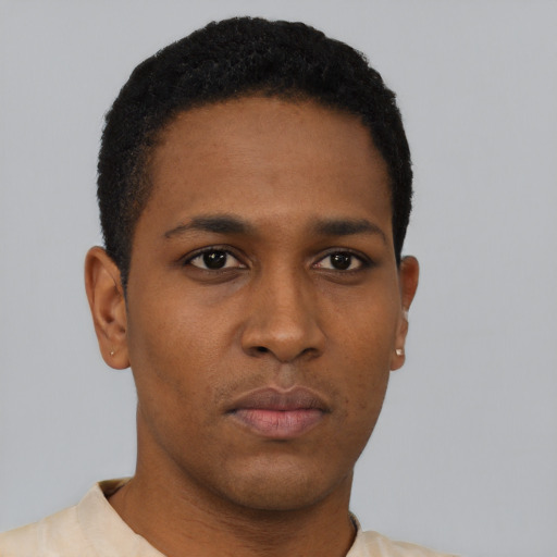 Neutral black young-adult male with short  black hair and brown eyes
