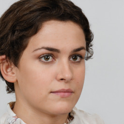 Neutral white young-adult female with short  brown hair and brown eyes