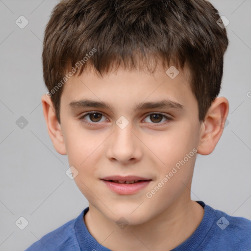 Joyful white child male with short  brown hair and brown eyes