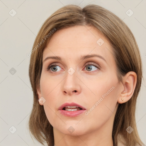 Neutral white young-adult female with long  brown hair and grey eyes