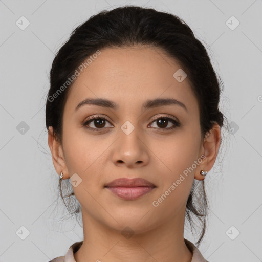 Joyful latino young-adult female with medium  brown hair and brown eyes