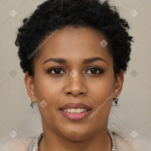 Joyful black young-adult female with short  brown hair and brown eyes
