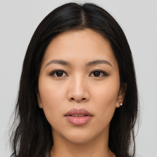 Neutral asian young-adult female with long  brown hair and brown eyes