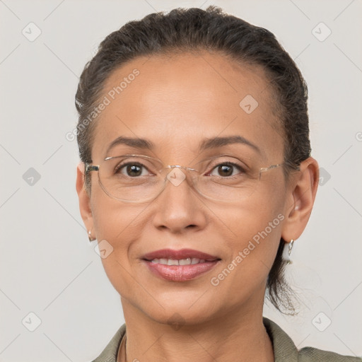 Joyful white adult female with short  brown hair and brown eyes