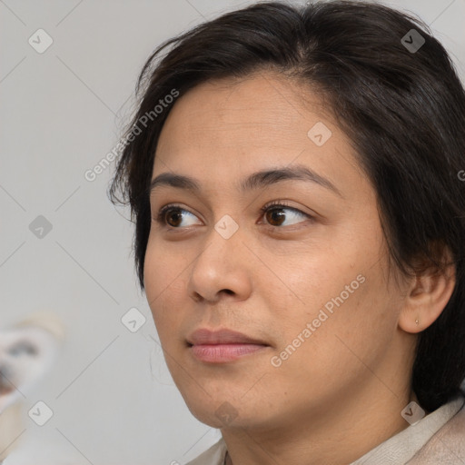 Neutral asian young-adult female with medium  brown hair and brown eyes