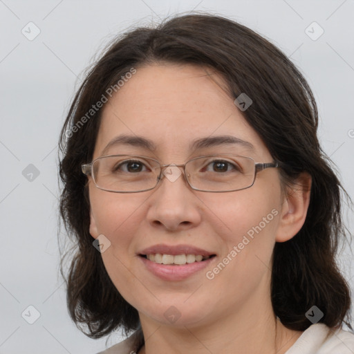 Joyful white adult female with medium  brown hair and brown eyes