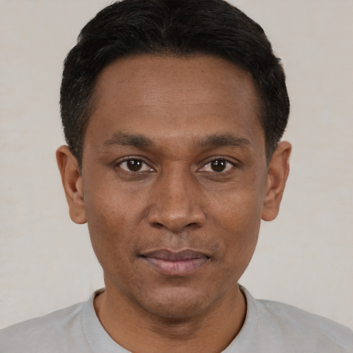 Neutral black young-adult male with short  black hair and brown eyes