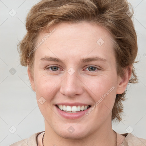 Joyful white young-adult female with medium  brown hair and blue eyes