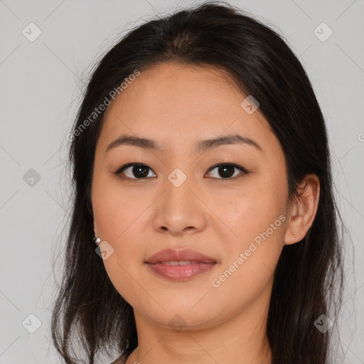 Joyful asian young-adult female with long  brown hair and brown eyes