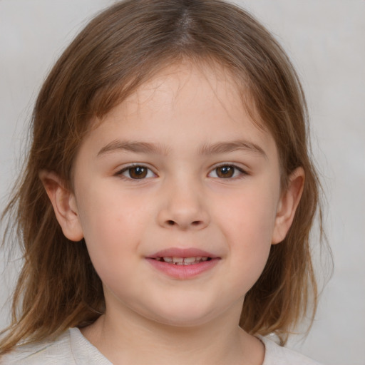 Joyful white child female with medium  brown hair and brown eyes