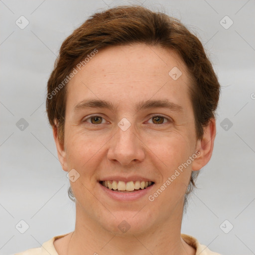 Joyful white young-adult female with short  brown hair and grey eyes