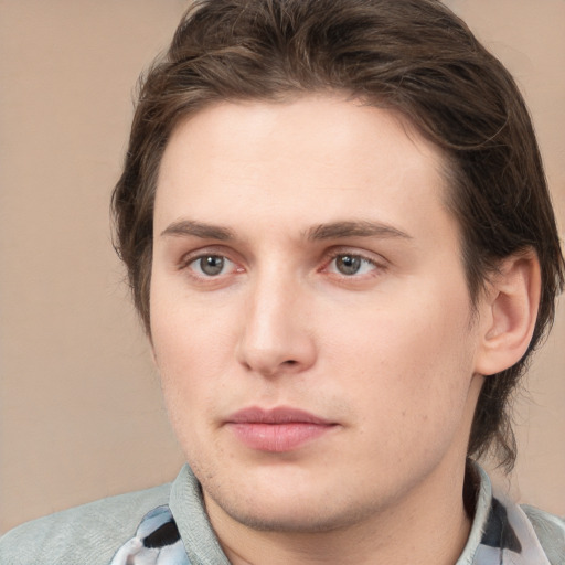 Neutral white young-adult male with medium  brown hair and grey eyes