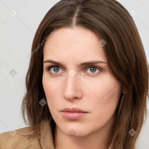 Neutral white young-adult female with long  brown hair and brown eyes