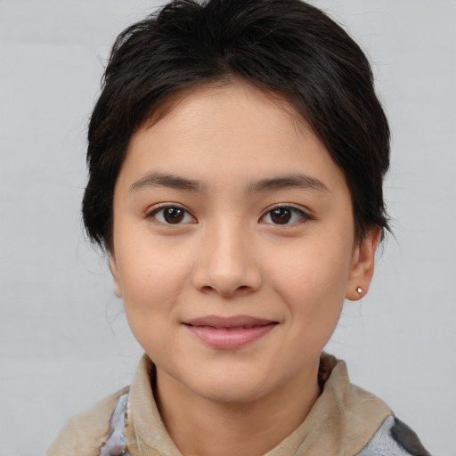 Joyful white young-adult female with medium  brown hair and brown eyes