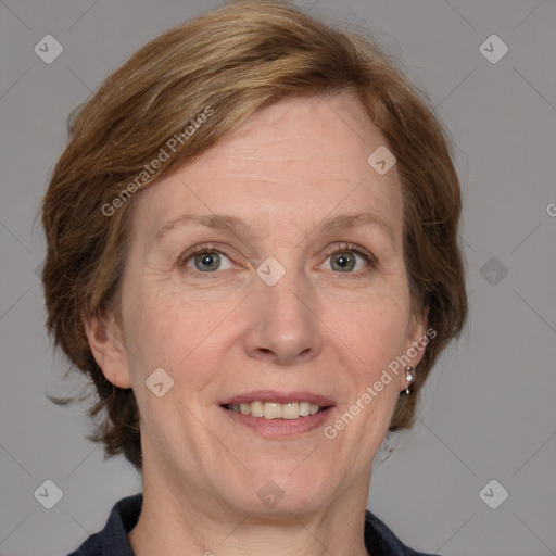 Joyful white adult female with medium  brown hair and grey eyes