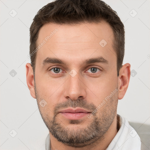 Neutral white young-adult male with short  brown hair and brown eyes