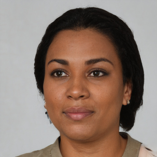 Neutral black young-adult female with medium  black hair and brown eyes
