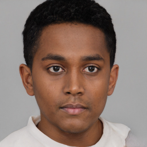 Neutral black young-adult male with short  brown hair and brown eyes