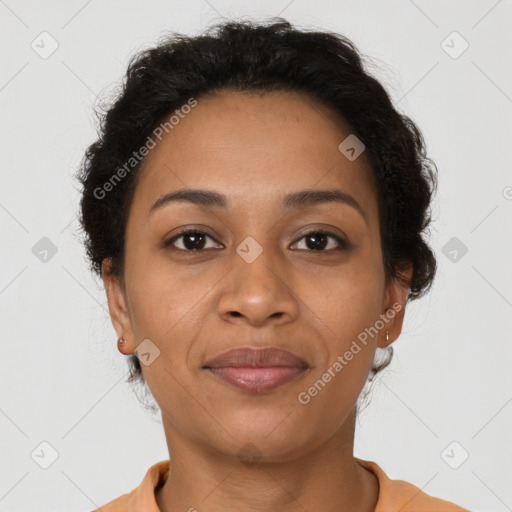 Joyful latino young-adult female with short  brown hair and brown eyes