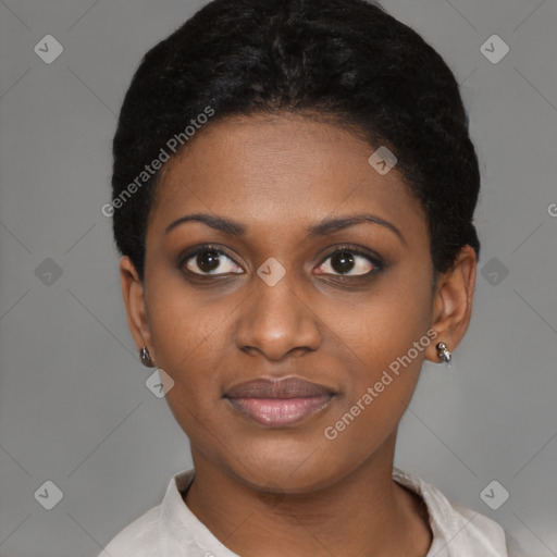 Joyful black young-adult female with short  black hair and brown eyes