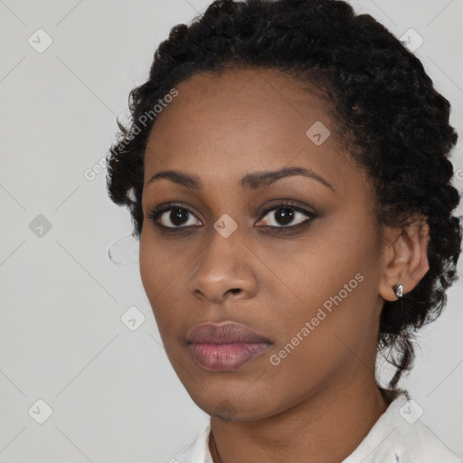 Neutral black young-adult female with short  black hair and brown eyes