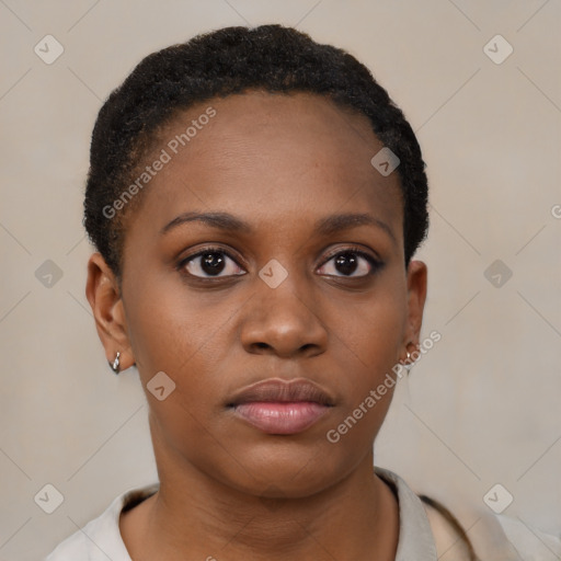 Neutral black young-adult female with short  brown hair and brown eyes