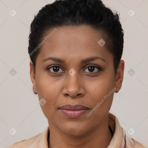 Joyful black adult female with short  brown hair and brown eyes