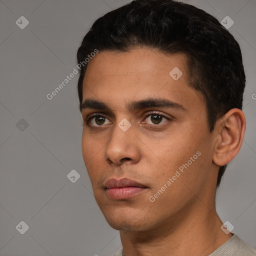 Neutral white young-adult male with short  black hair and brown eyes