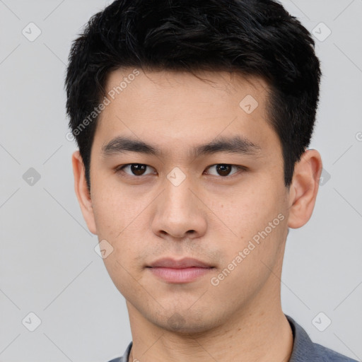 Neutral asian young-adult male with short  black hair and brown eyes