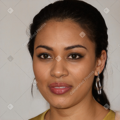 Joyful latino young-adult female with medium  black hair and brown eyes