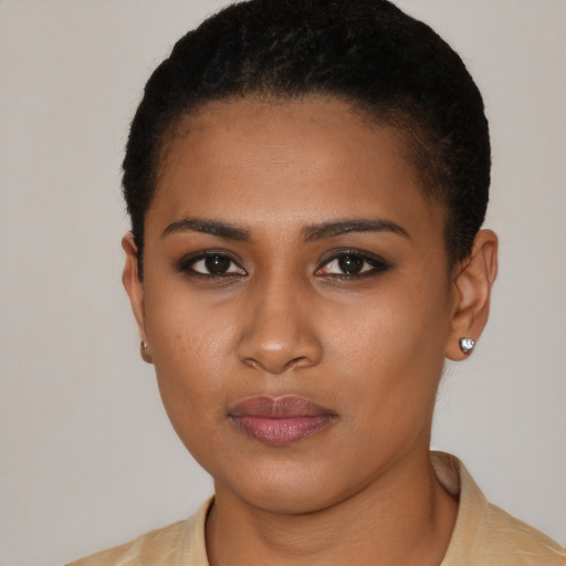Neutral black young-adult female with short  black hair and brown eyes