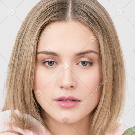 Neutral white young-adult female with long  brown hair and green eyes