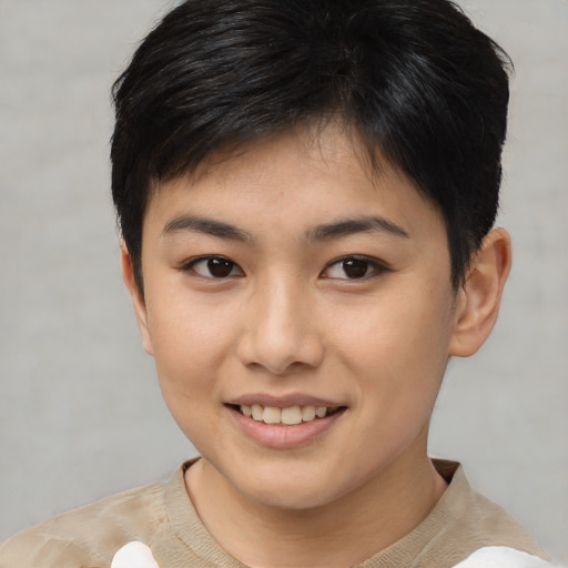 Joyful asian young-adult female with short  brown hair and brown eyes