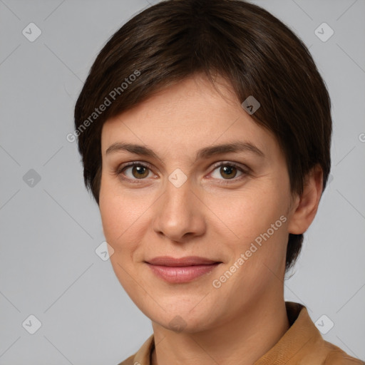 Joyful white young-adult female with short  brown hair and grey eyes