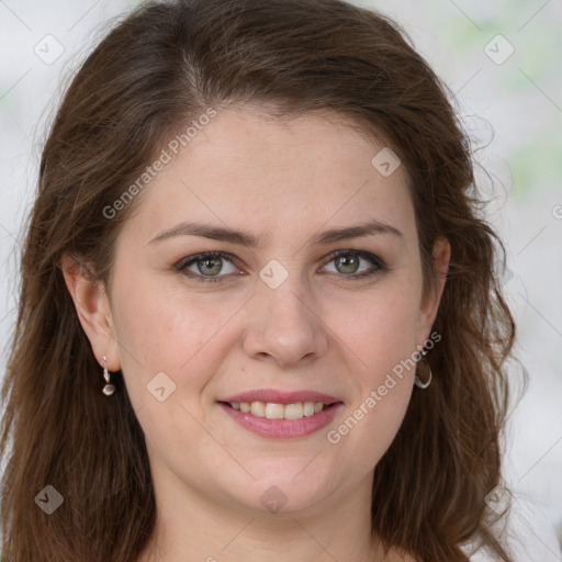 Joyful white young-adult female with long  brown hair and green eyes