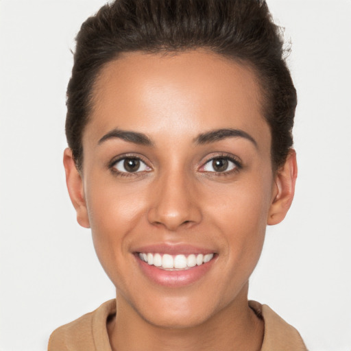 Joyful white young-adult female with short  brown hair and brown eyes