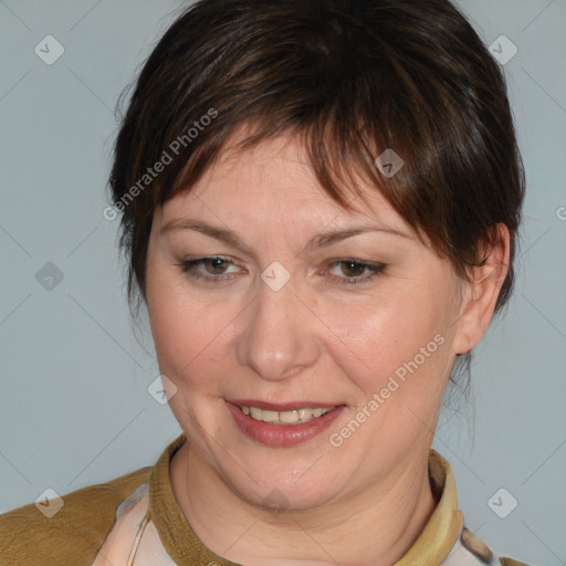 Joyful white adult female with medium  brown hair and brown eyes